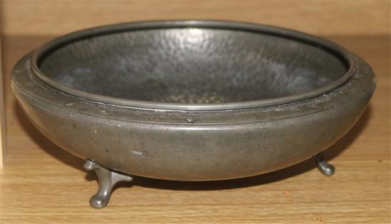 A pewter bowl